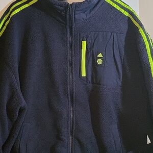 Adidas. MANCHESTER UNITED. Men's fleece with full zipper.